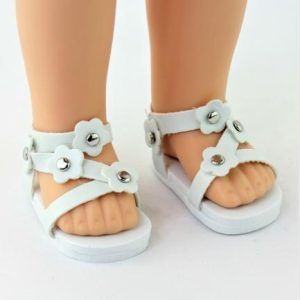 Smaller doll size. Fits 14.5" dolls like Wellie Wishers. White flower sandals.